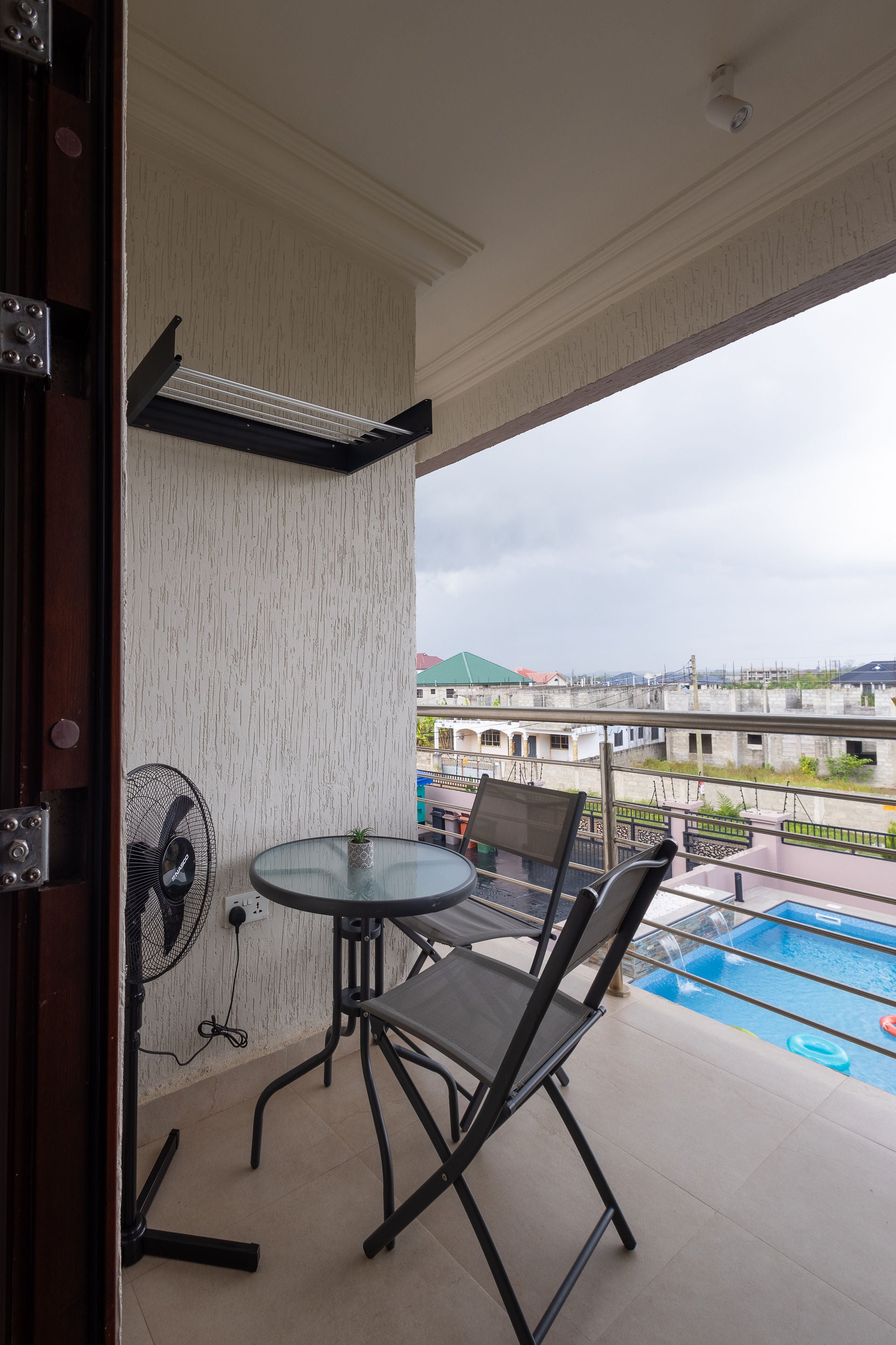 Private balcony overlooking the pool