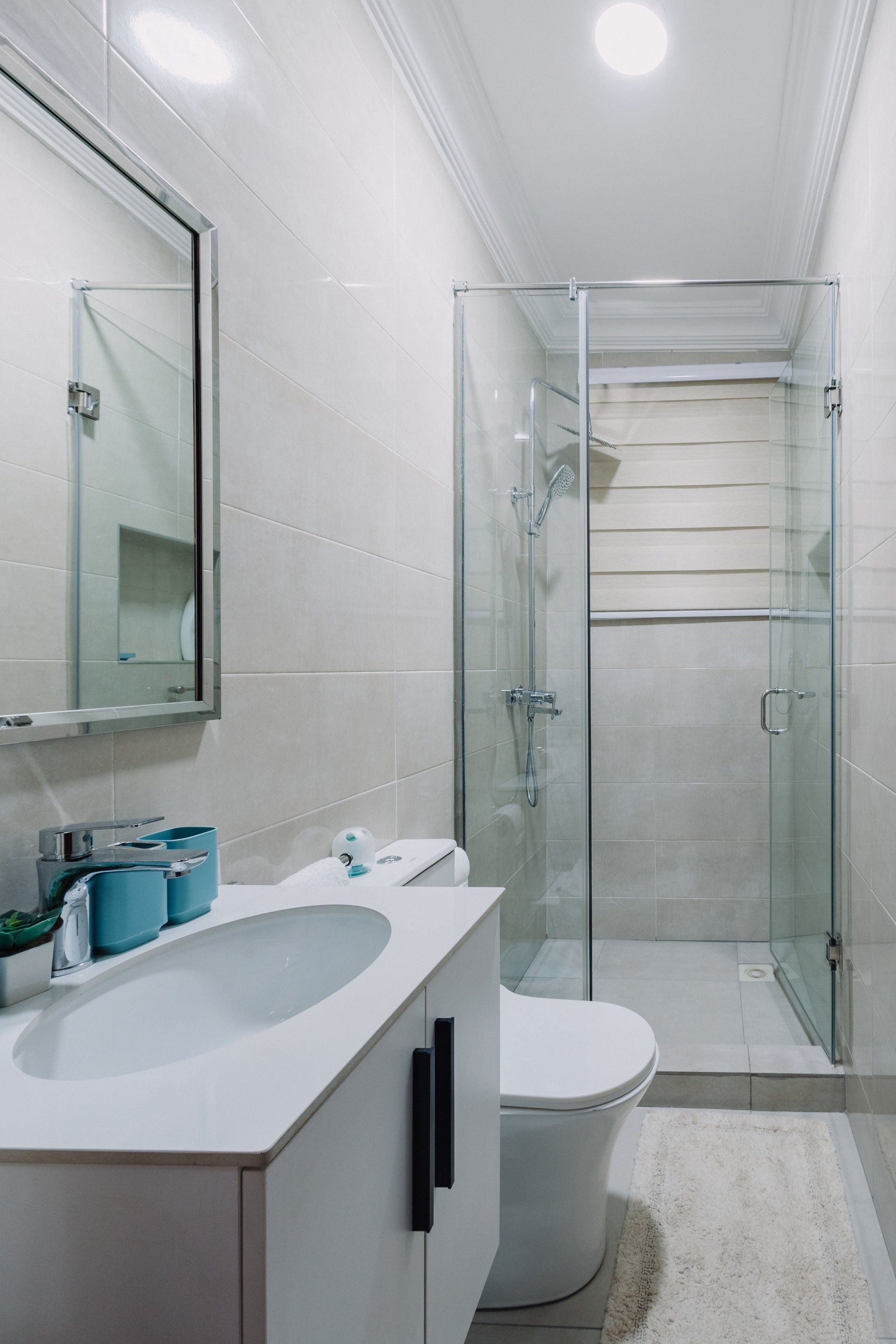 Walk-in glass shower and vanity