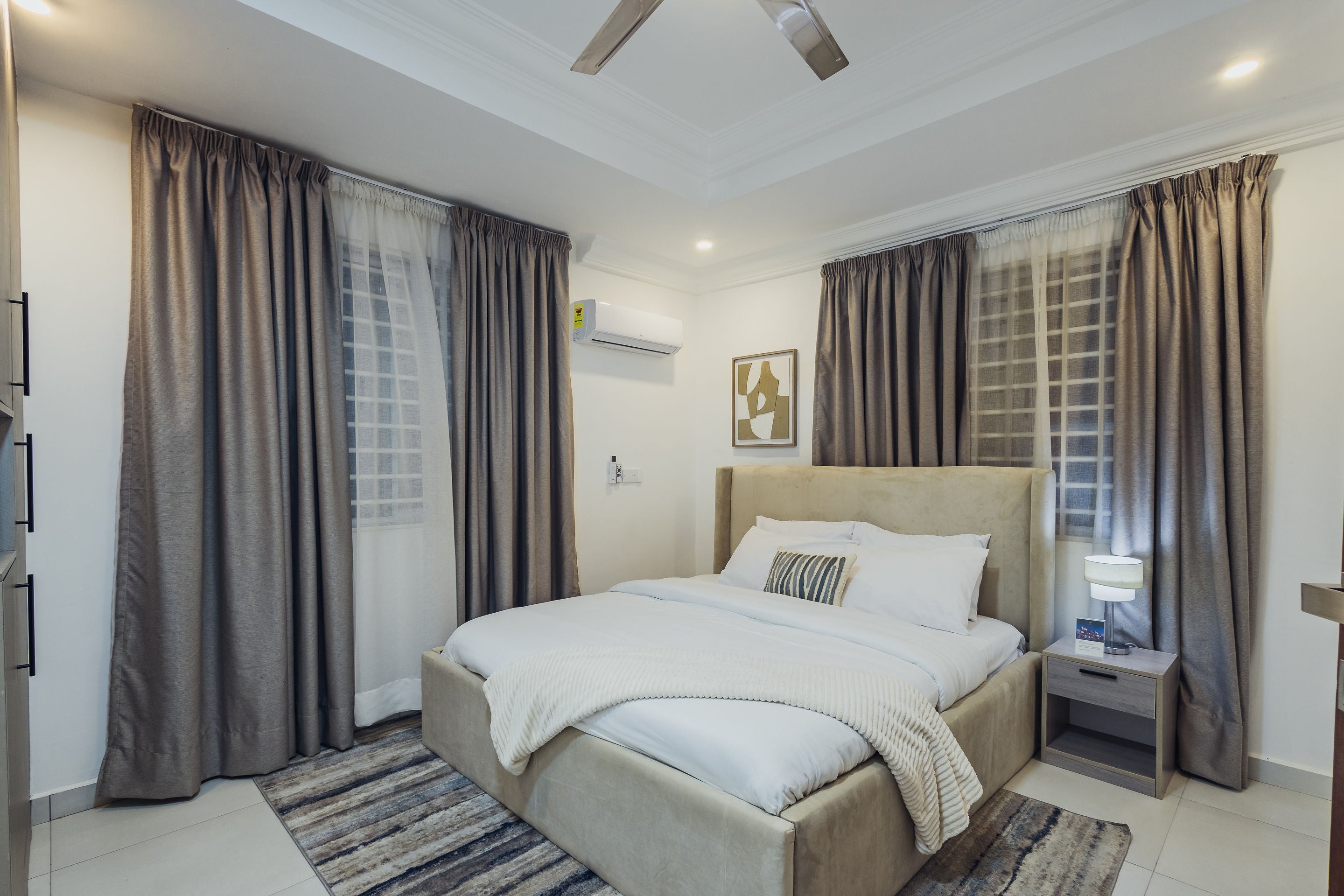 Calm bedroom with soft neutral bedding